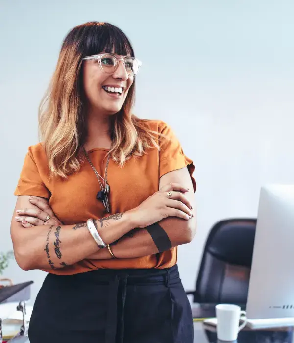 photograph of a person sitting and smiling